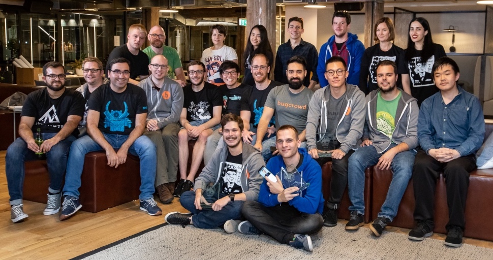 The BugCrowd team poses together at their headquarters.