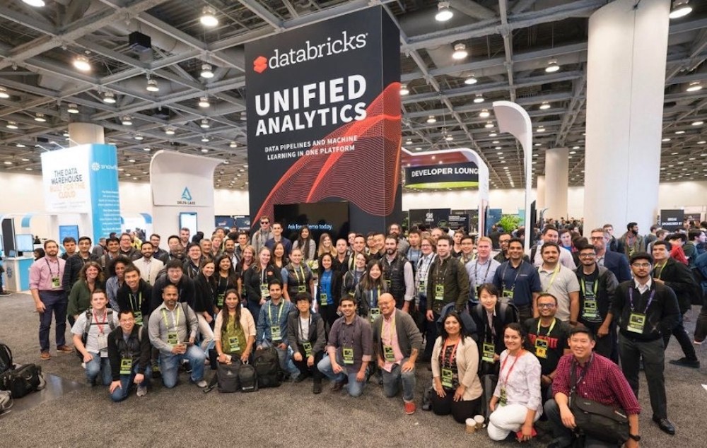The Databricks team gathers for a group photo prior to the pandemic. 