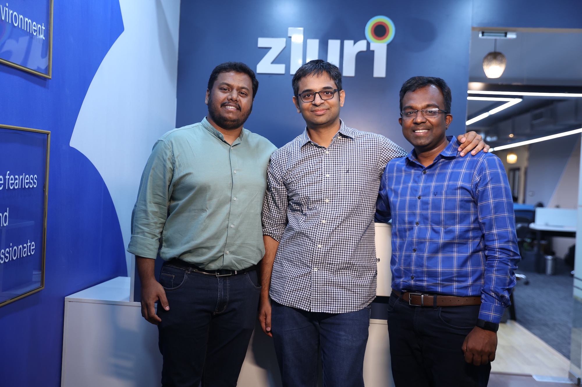 Zluri's co-founders pose together for a photo.