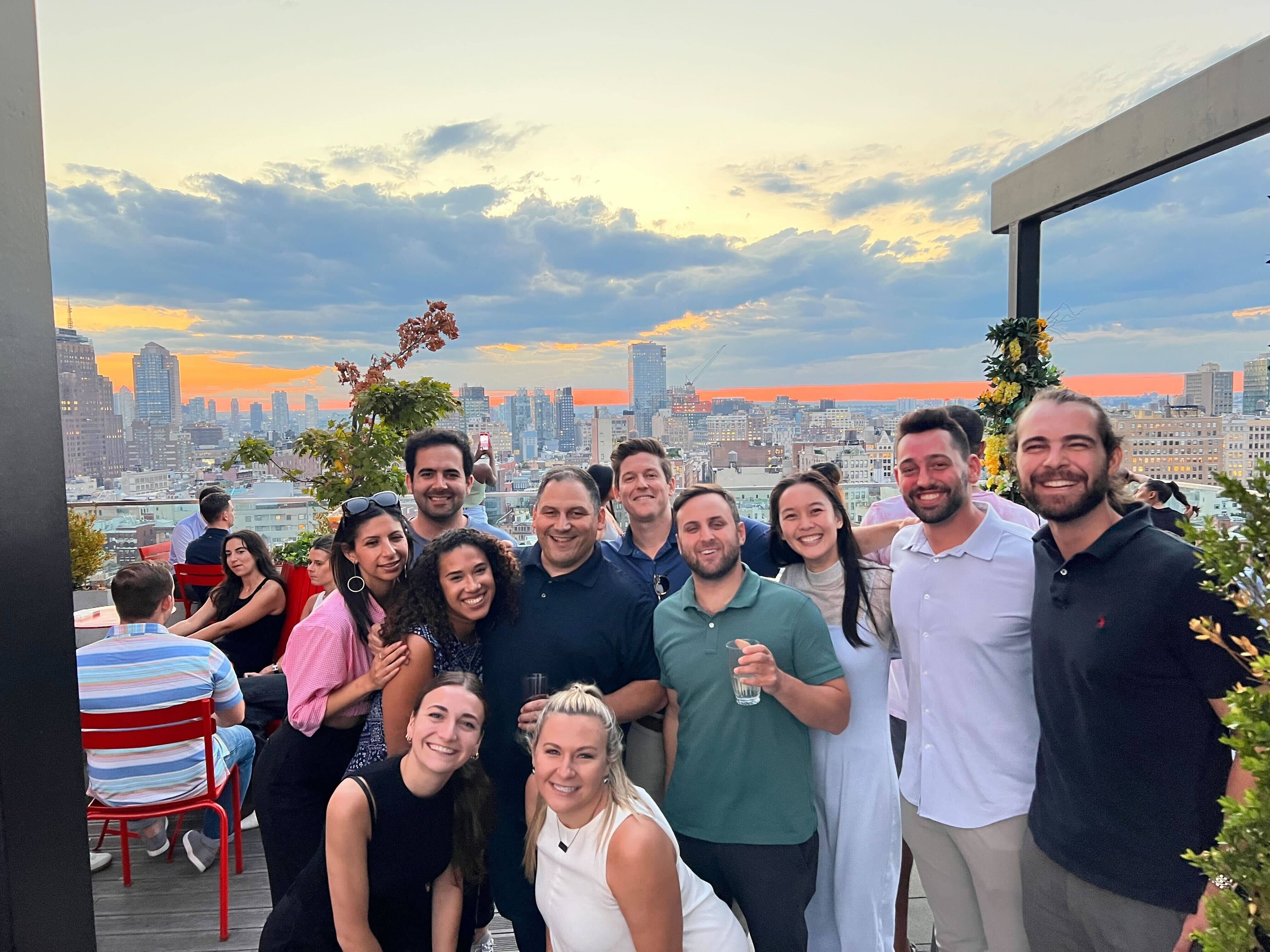 The Instawork team on a rooftop
