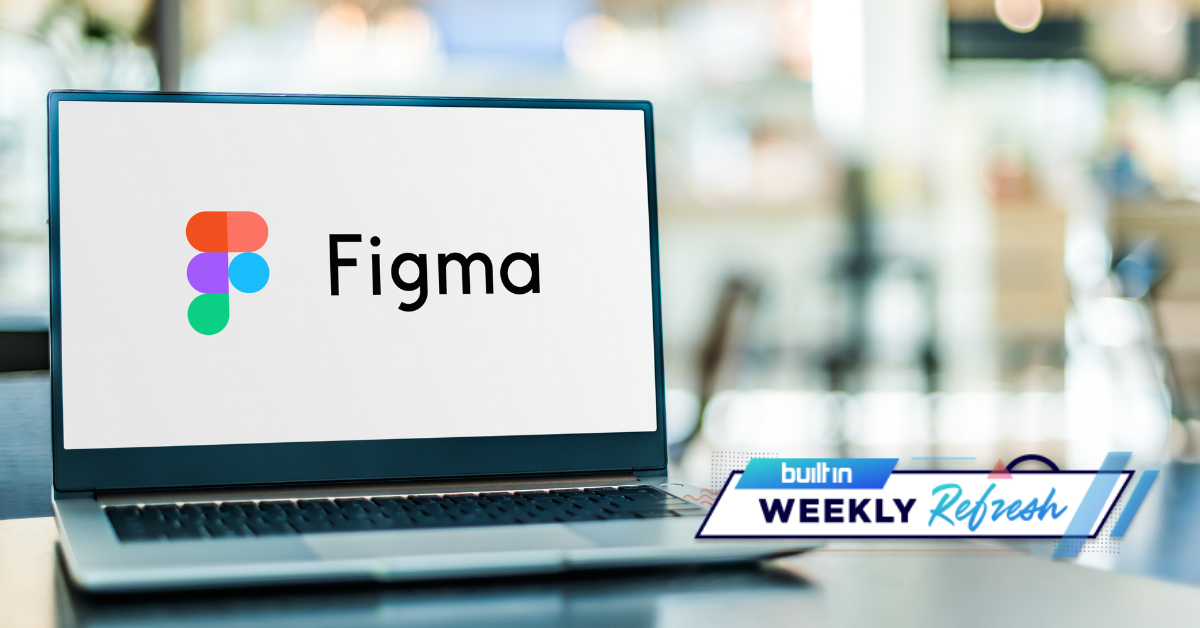 Figma's logo on a laptop screen resting on a desk.