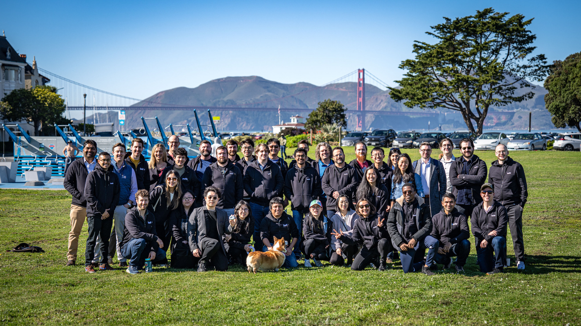 Butlr’s San Francisco and Boston team gather for a group photo outdoors.