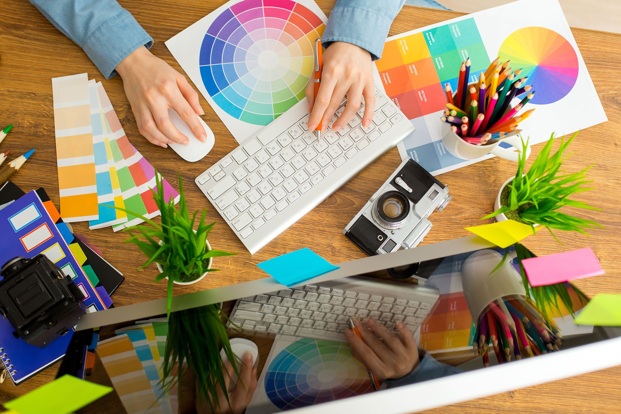 An image of a graphic designer at work is shown.
