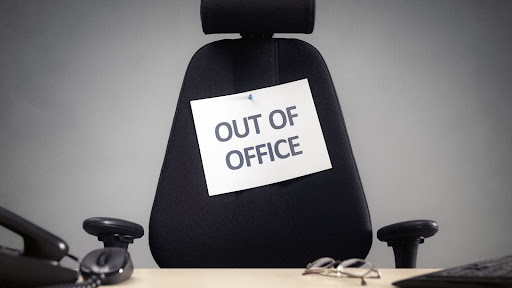 out of office notice on an office chair