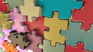 Brightly colored 3D puzzle pieces