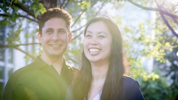 Banyan Infrastructure co-founders Will Greene (CEO) and Amanda Li (COO) pose outside for a photo.