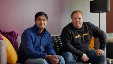 Rippling co-founders Prasanna Sankar (left) and Parker Conrad (right) pose together for a photo.