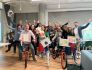 PagerDuty employees on bicycles in their office